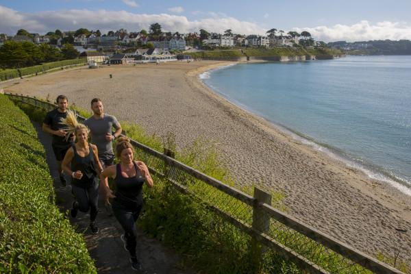 Runners at Gyllyngvase Beach