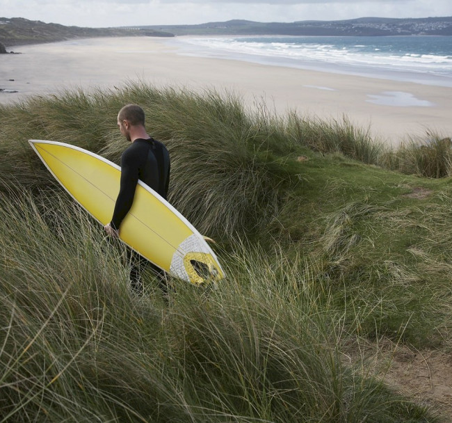 Swimming costumes, wetsuits and flip flops