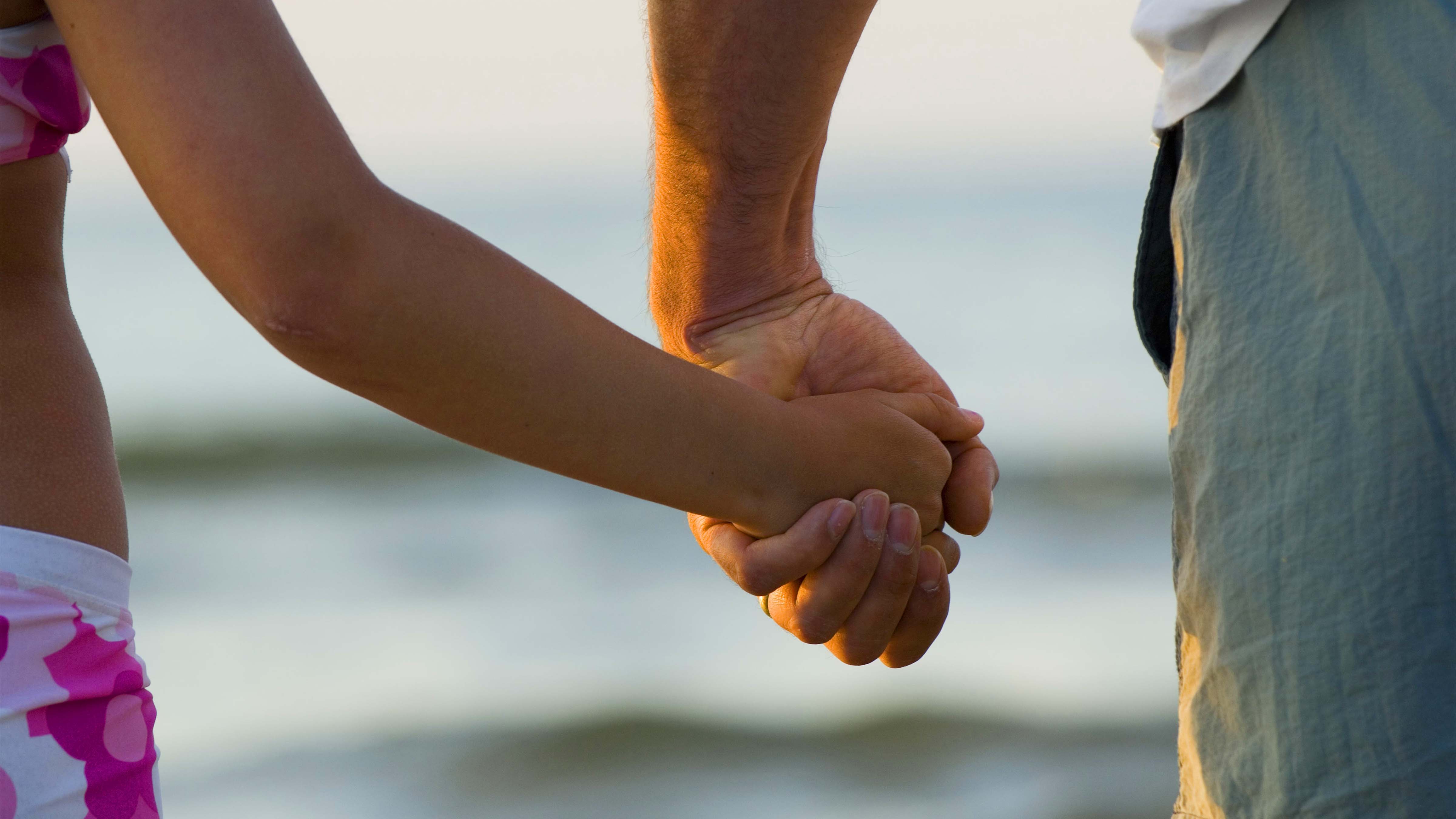 Gylly Beach Holding Hands