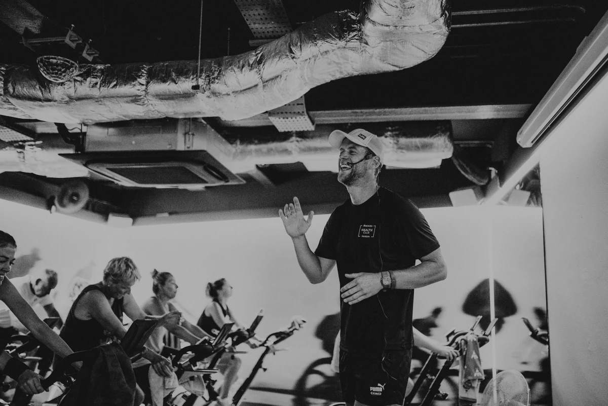A St Michaels Health Club instructor leading an indoor cycling class in Falmouth