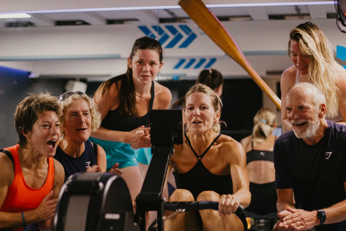 Members cheering on a rower at St Michaels Health Club, Falmouth